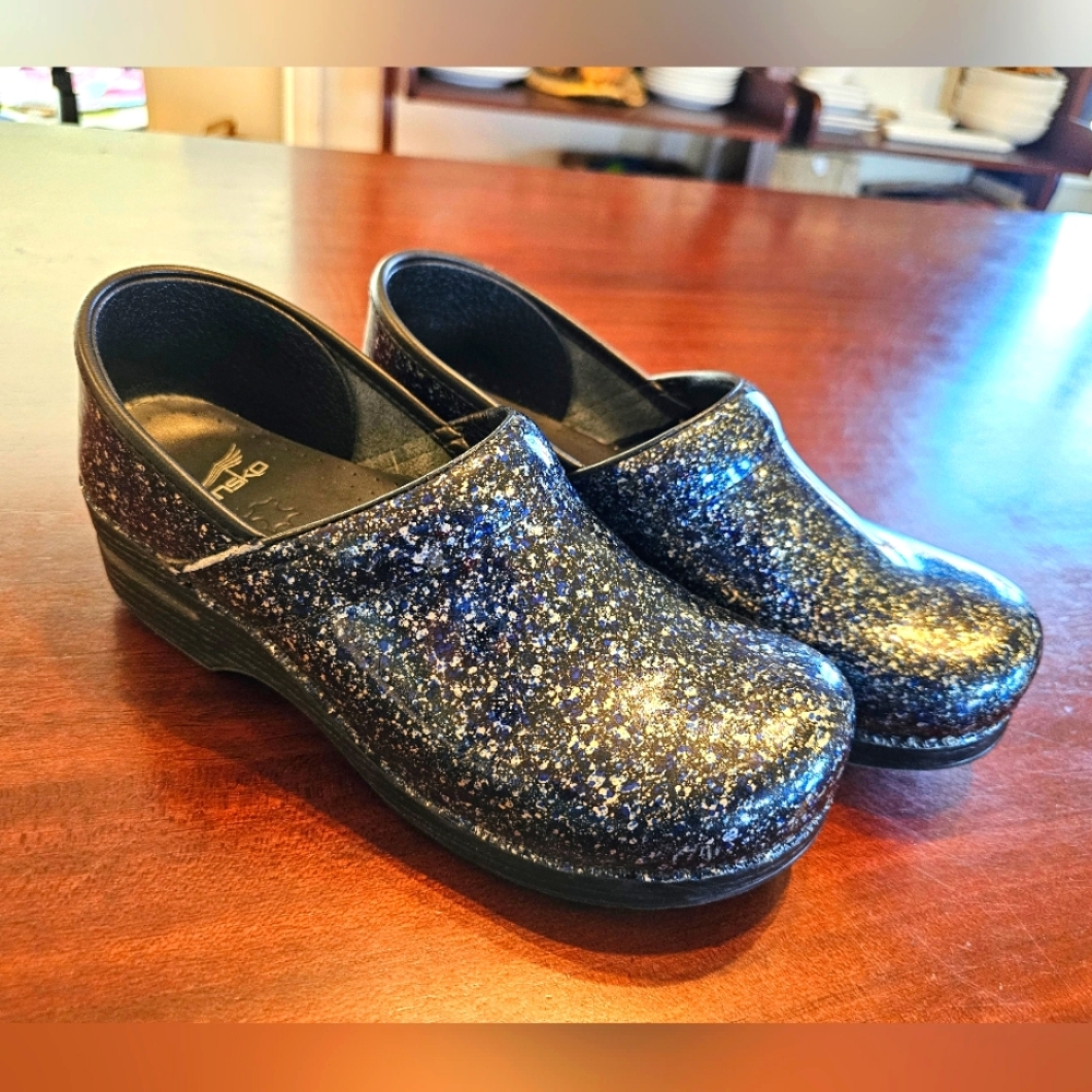 Dansko black blue and white speckled clogs